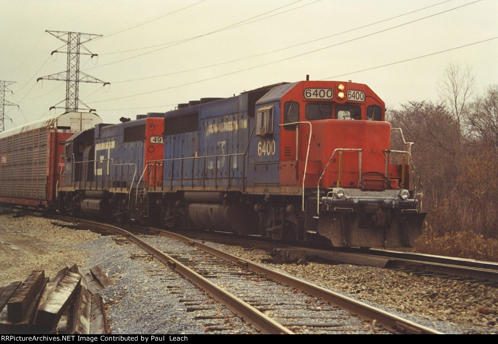 Vehicle train approaches Lang Yard